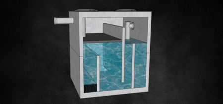 Illustration of an oil-water separator system, constructed from precast concrete with transparent viewing panels showing the separation process inside, equipped with an inlet pipe, internal baffles, and a secure top with service access, against a dark backdrop.
